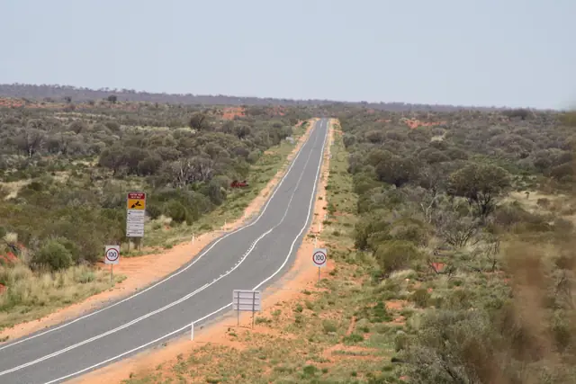 The Lasseter Highway near Mount Conner lookout on the road to Uluru