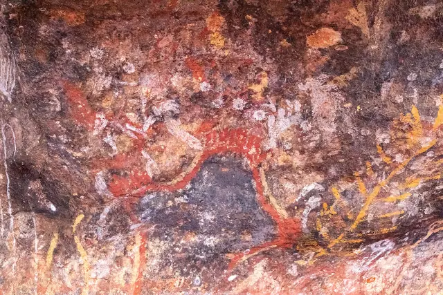 Rock painting in a shelter along the Kuniya Walk at Uluru