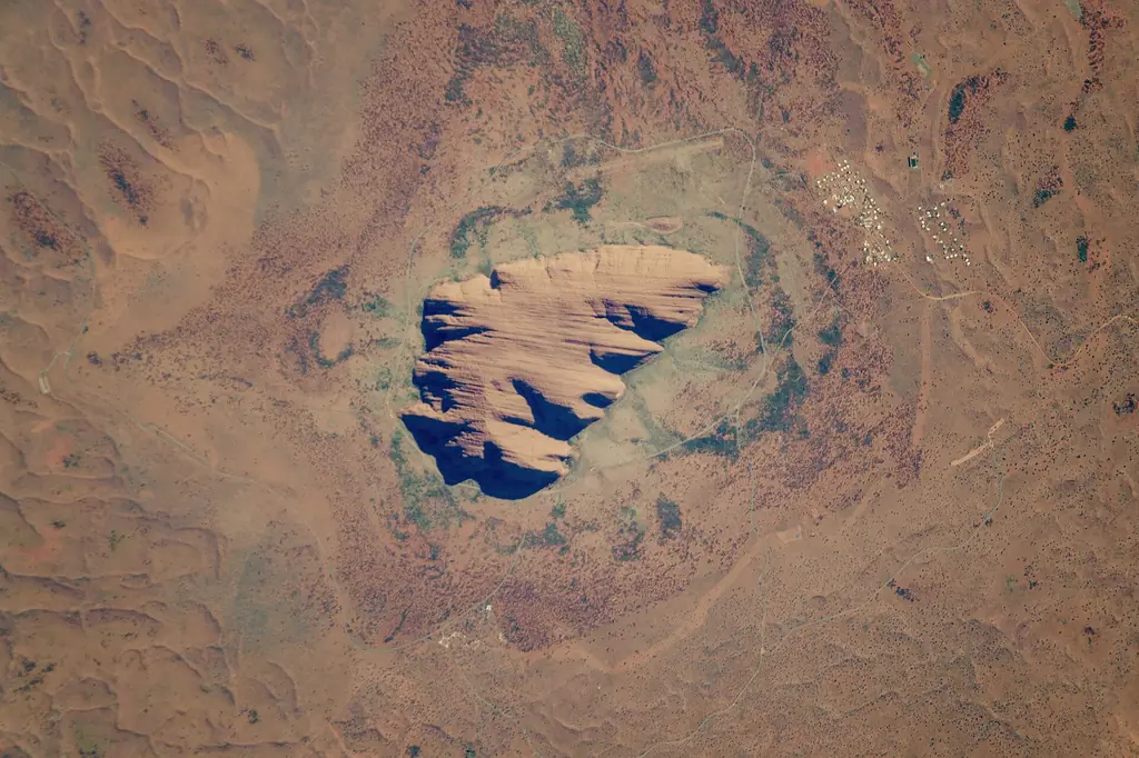 Uluru seen from the International Space Station in the centre of Australia's red desert